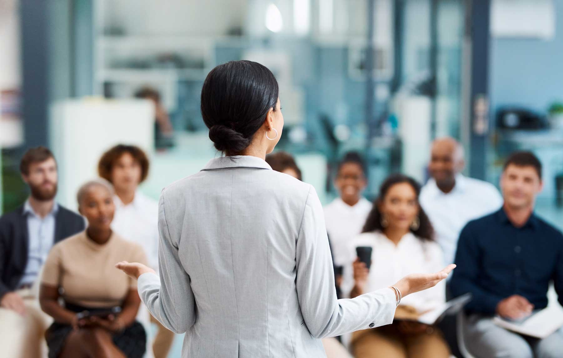 three people in a meeting